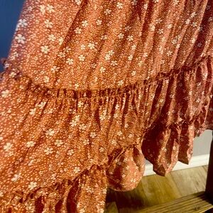 Tiered dress. Spaghetti straps. Dusty rose with white flowers